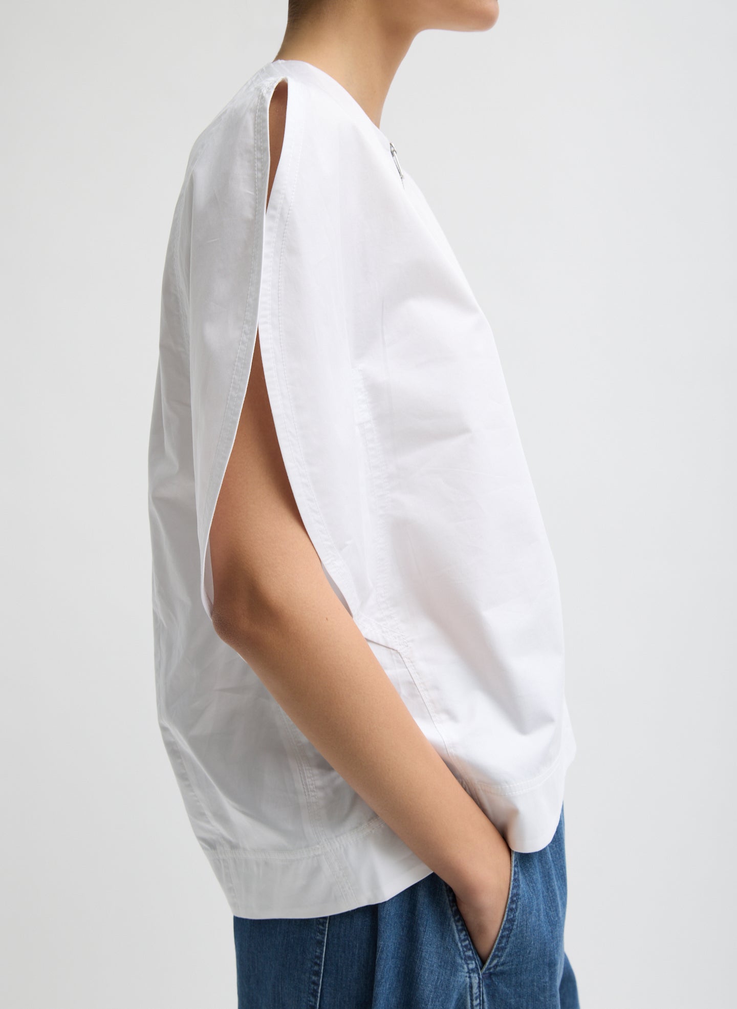 White Eco Poplin Balloon Origami Top - puff sleeve, zip up, side view on model