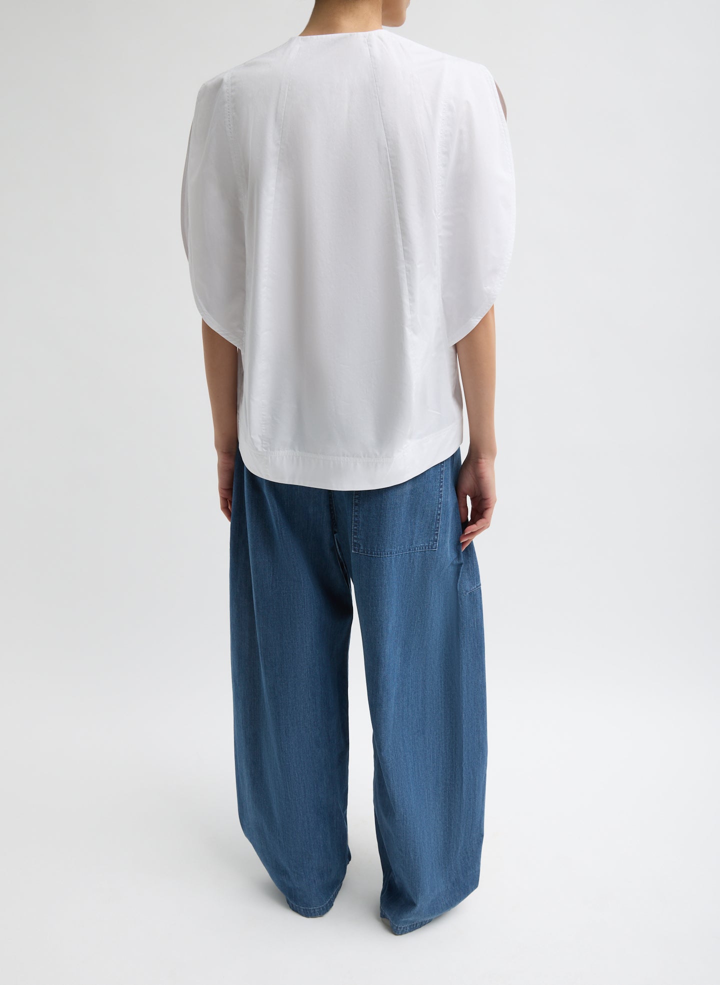 White Eco Poplin Balloon Origami Top - puff sleeve, zip up, back view on model