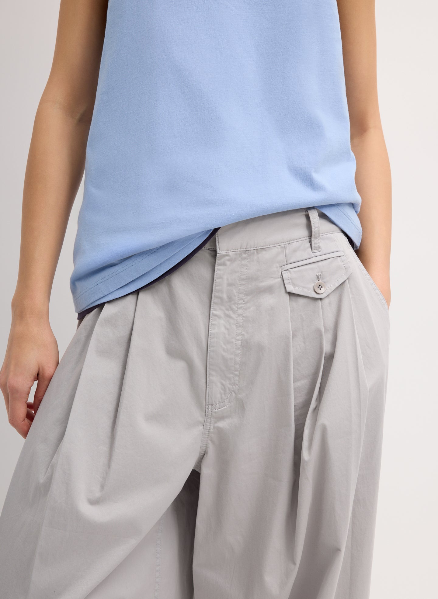 Light Grey Garment Dyed Silky Cotton Triple Pleat Pant - closeup of pleated details at front