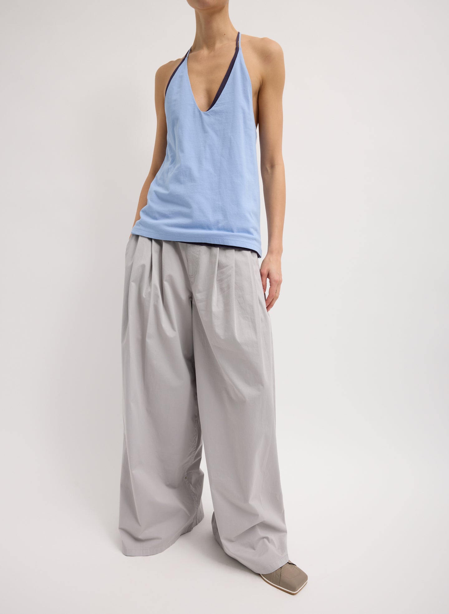 Light Grey Garment Dyed Silky Cotton Triple Pleat Pant - oversized trouser, front view on model