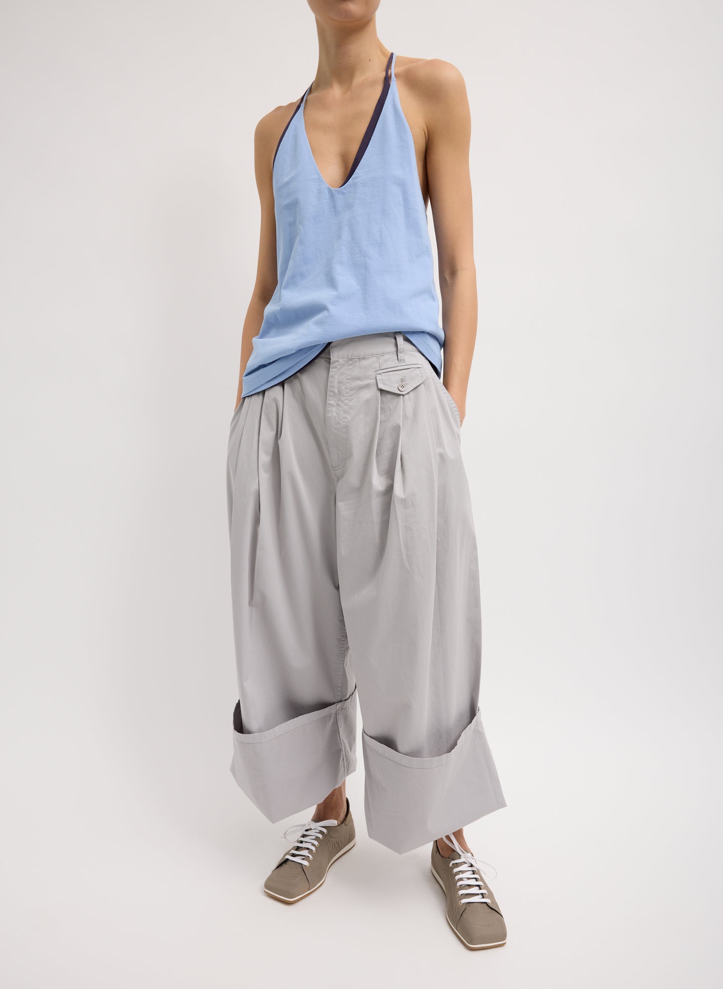 Light Grey Garment Dyed Silky Cotton Triple Pleat Pant - oversized trouser, double cuffed, front view on model