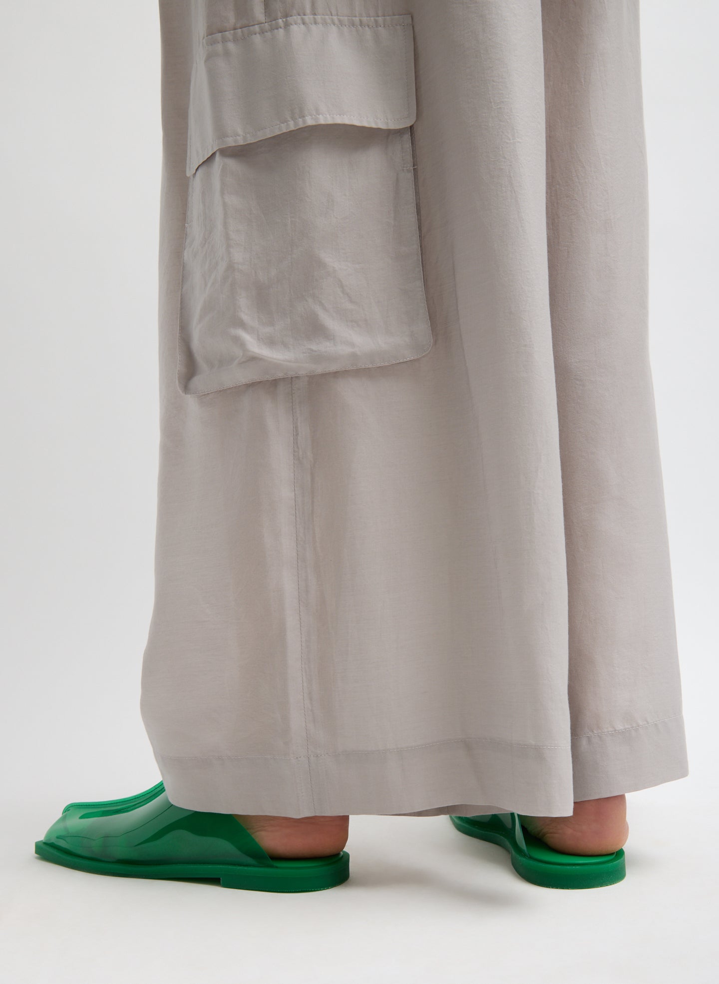 Light Stone Grey Silk Voile Cargo Triple Pleat Pant - closeup of hem and side pocket details