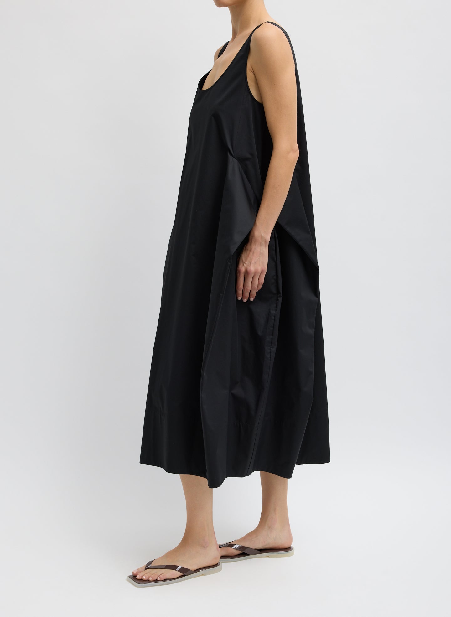Black Eco Poplin Tank Dress - sleeveless midi dress, side view on model