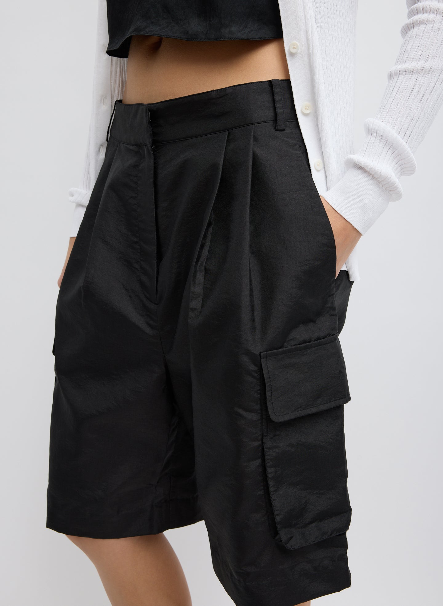 Black Crispy Nylon Stella Cargo Short - closeup of side pocket detail