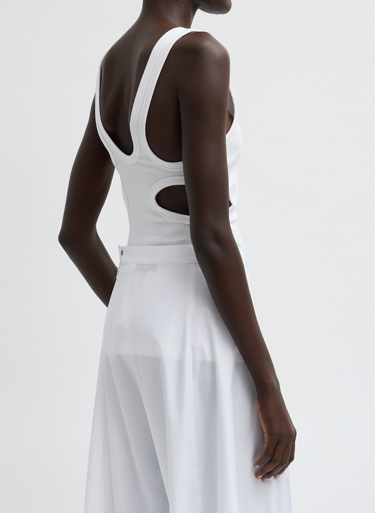White Ribbed Racerback Tank Top - side view on model