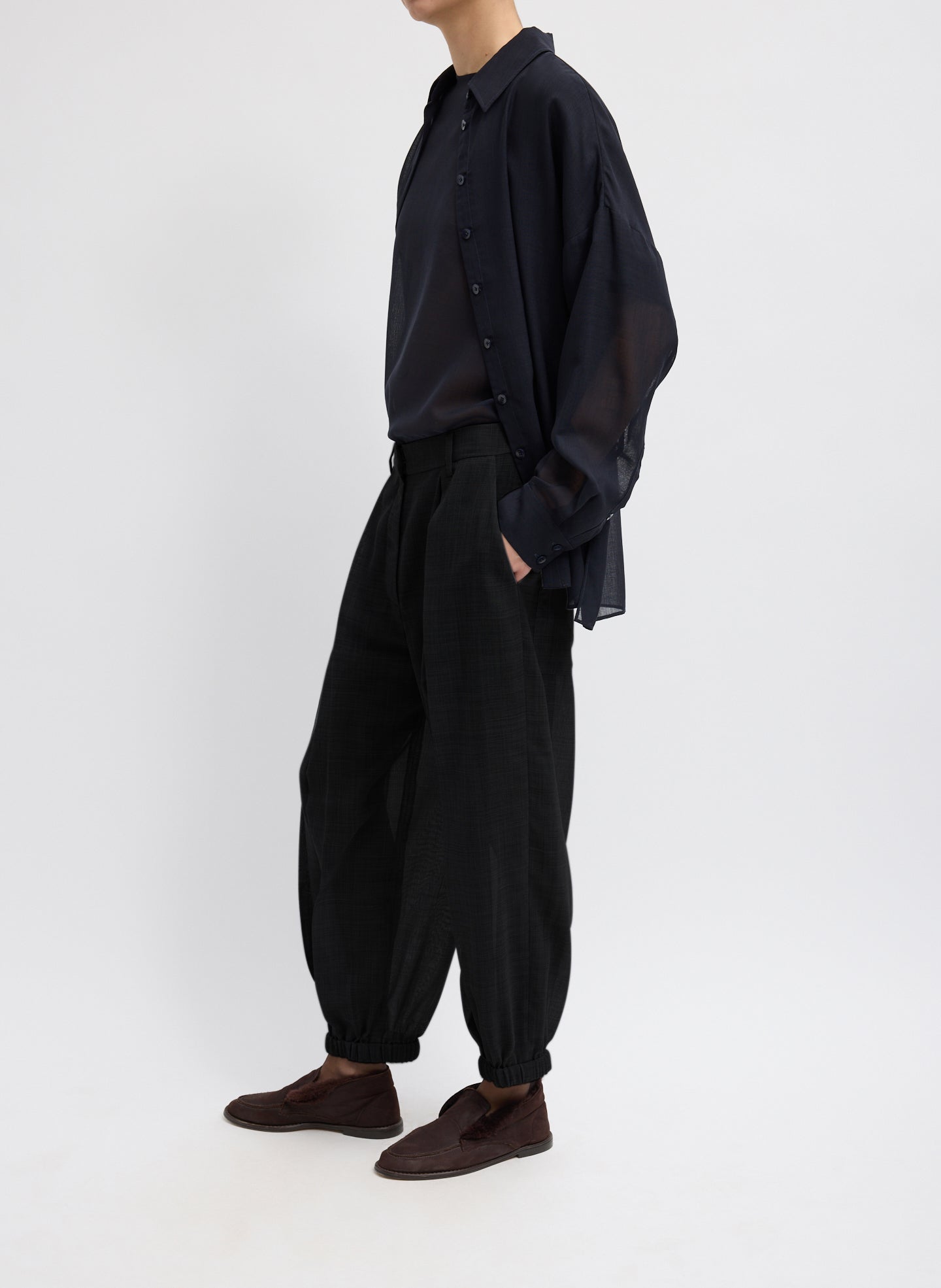 Black Sheer Wool Gauze Pleated Long Balloon Pant – relaxed fit, side view on model