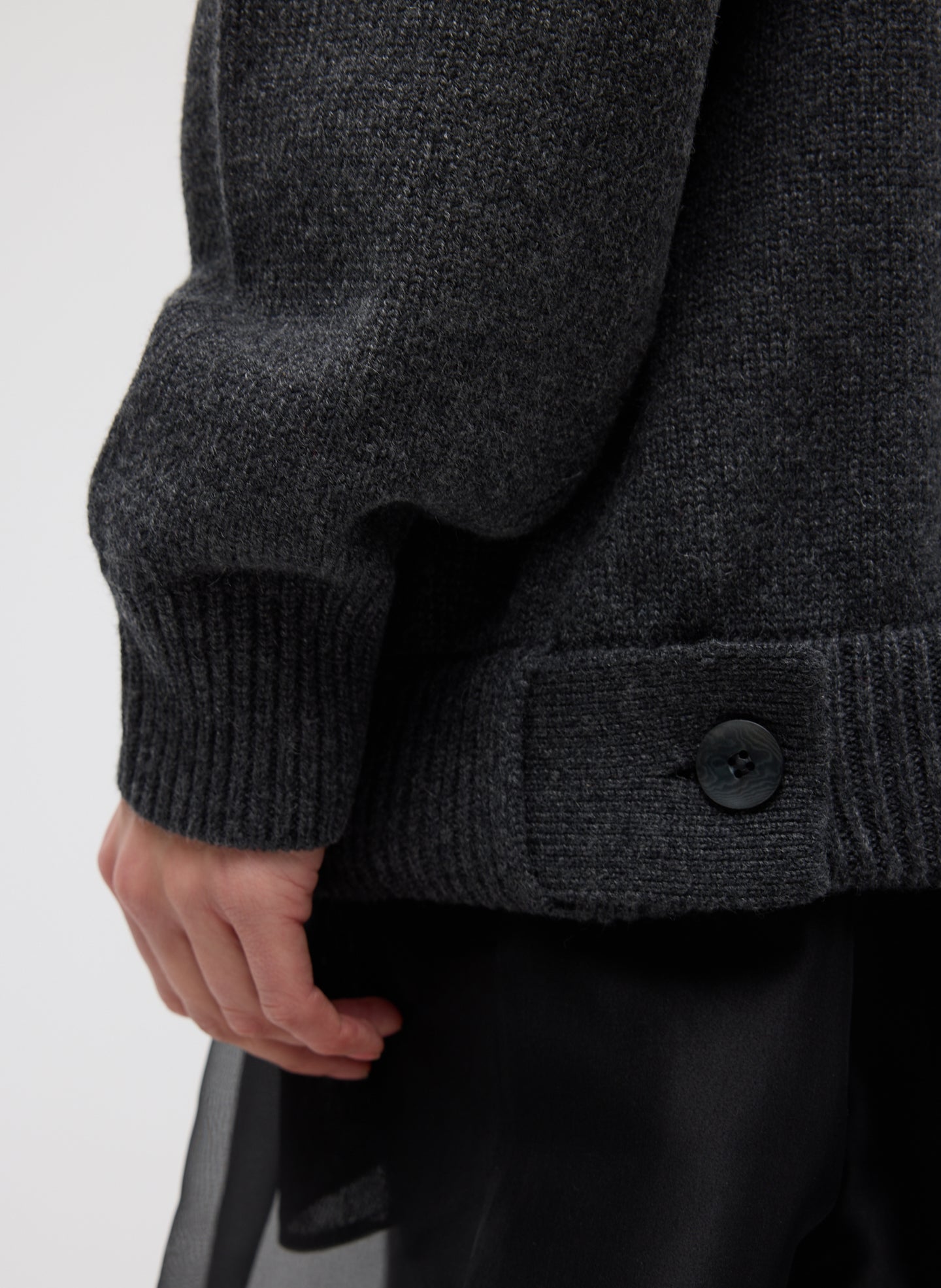 Grey Cashmere Turtleneck Oversized Pullover Sweater - closeup of button detail at hem