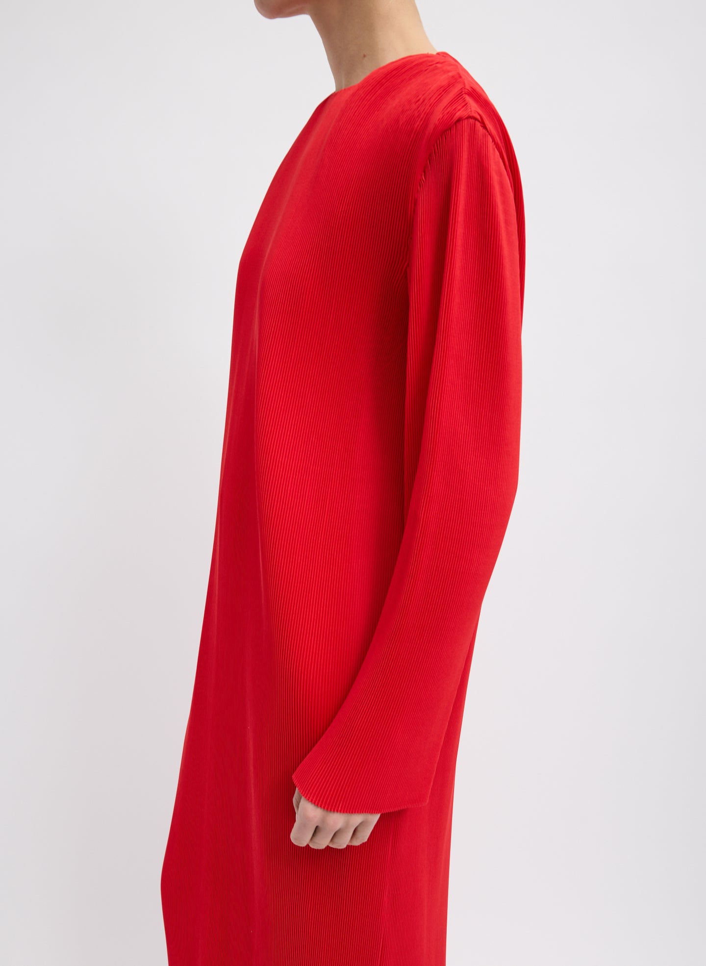 Red Plisse Midi Dress - long sleeve, closeup side view on model