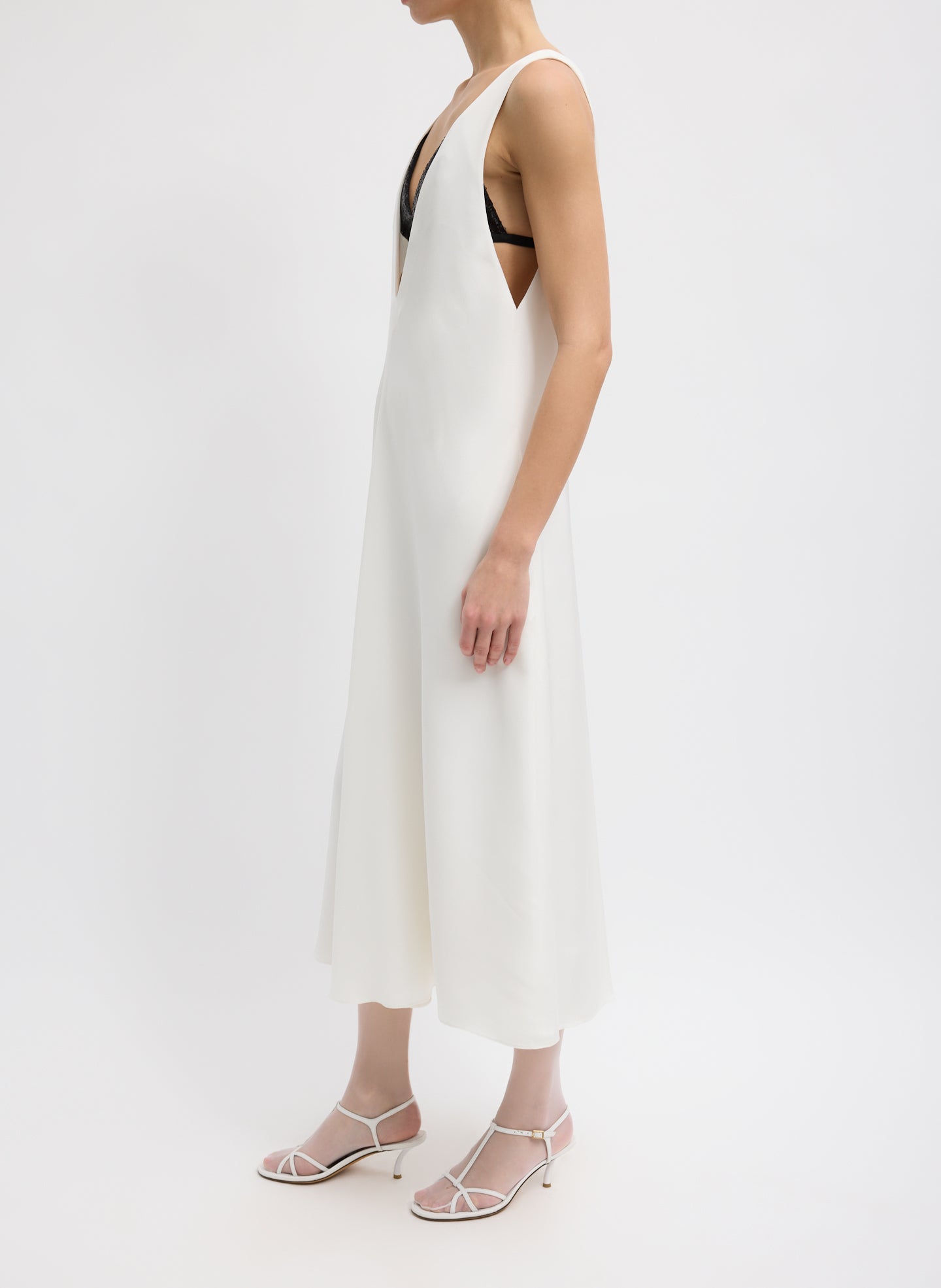 Ivory 4-Ply Silk V-Neck Dress With Bra - low cut v-neck, side view on model