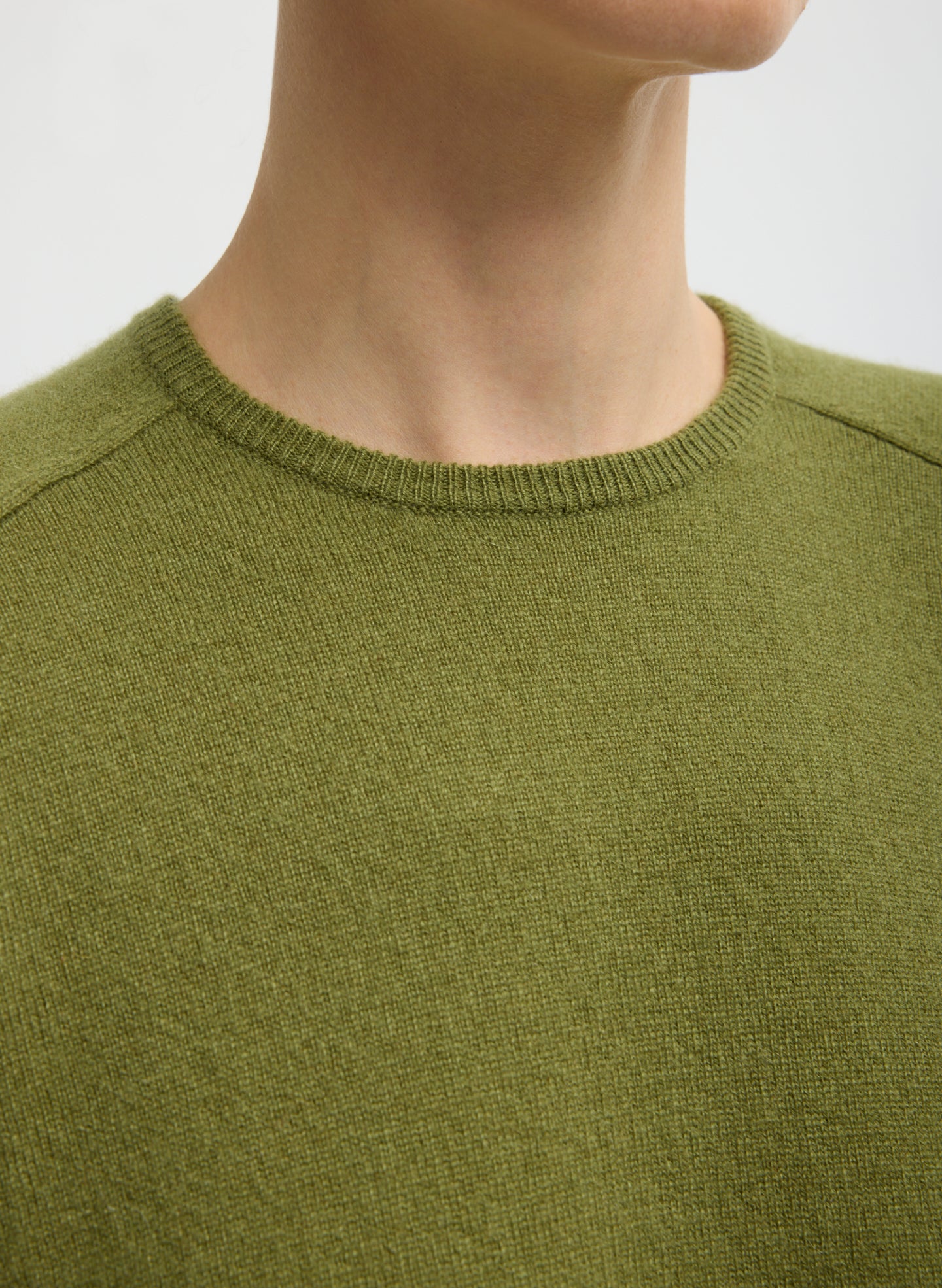Green Feather Weight Cashmere Sweater - closeup of crewneck detail