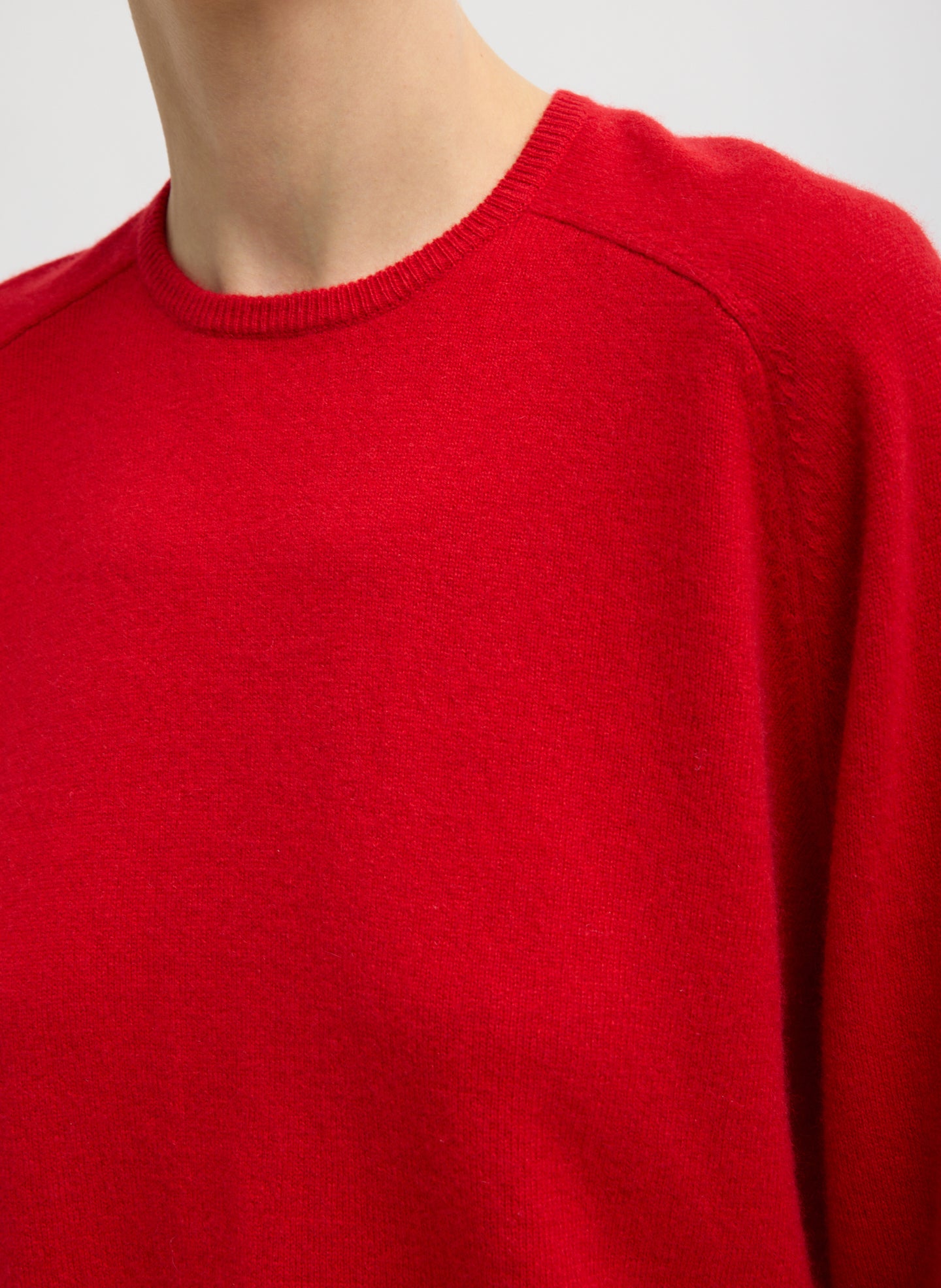 Red Feather Weight Cashmere Sweater - closeup of neckline
