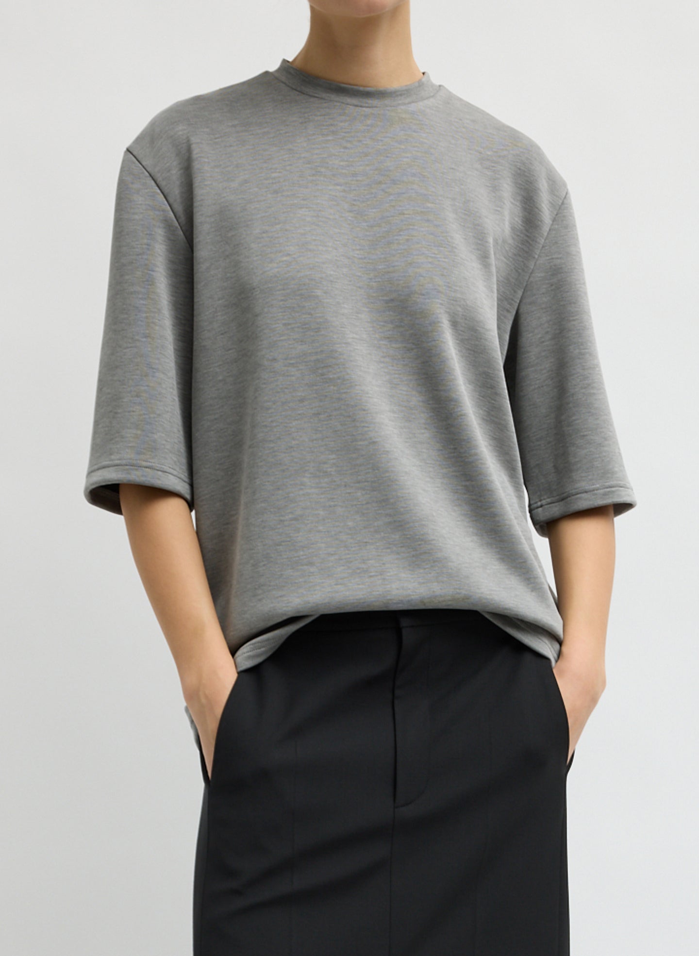 Grey Feather Weight Viscose Neoprene Removable Shoulder Pad Top - short sleeve t-shirt, front view on model