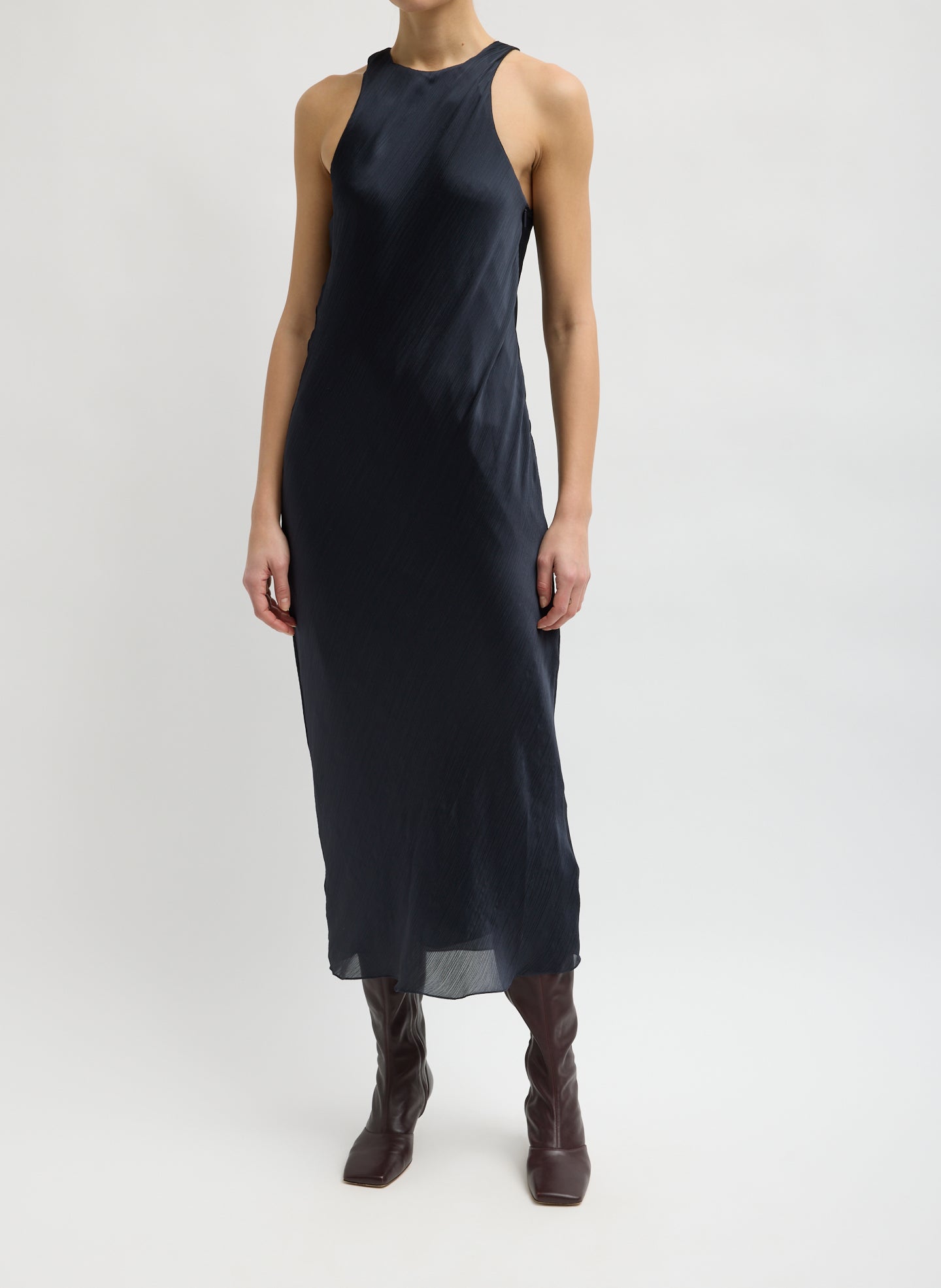 Matte Satin Plisse Midi Bias Dress - Navy Matte Satin Plisse Midi Bias Dress - front view on model