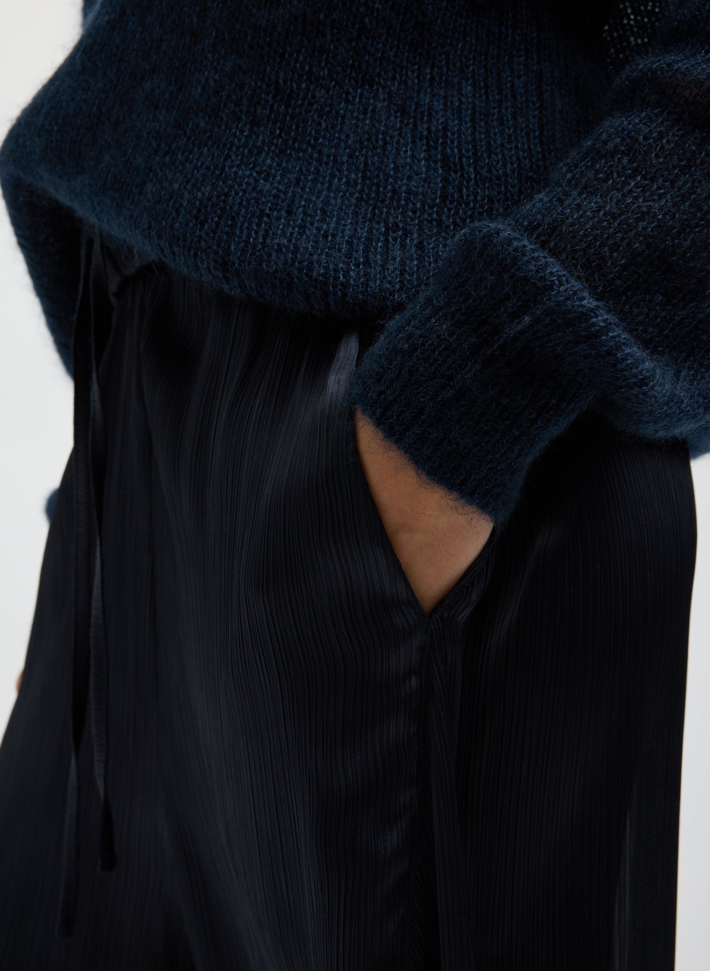 Navy Matte Satin Plisse Winslow Pant - closeup of pocket detail