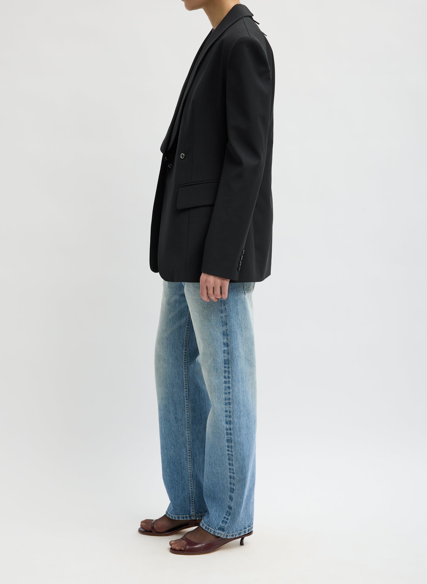 Black Recycled Tropical Wool Tuxedo Zip Blazer - side view on model
