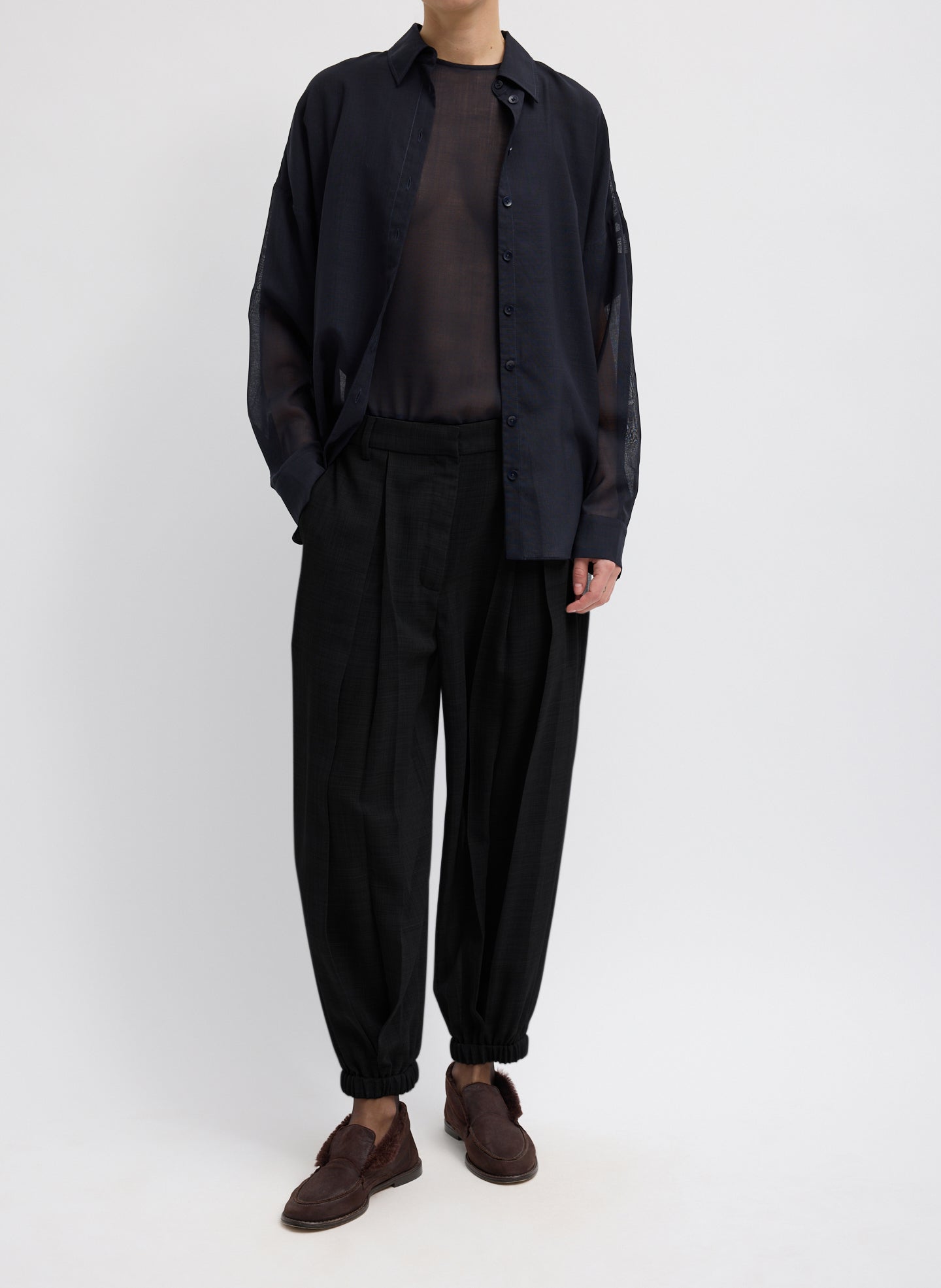 Black Sheer Wool Gauze Pleated Long Balloon Pant – relaxed fit, front view on model