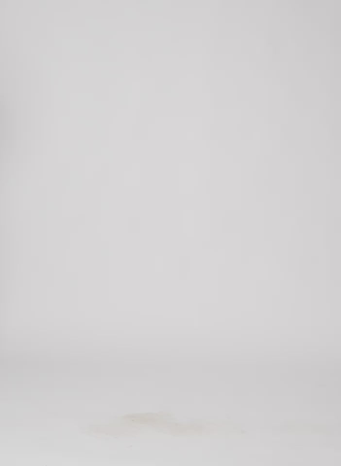 Model wearing the Franklin Oversized Shirt With Hem Detail Blue Multi walking forward and turning around