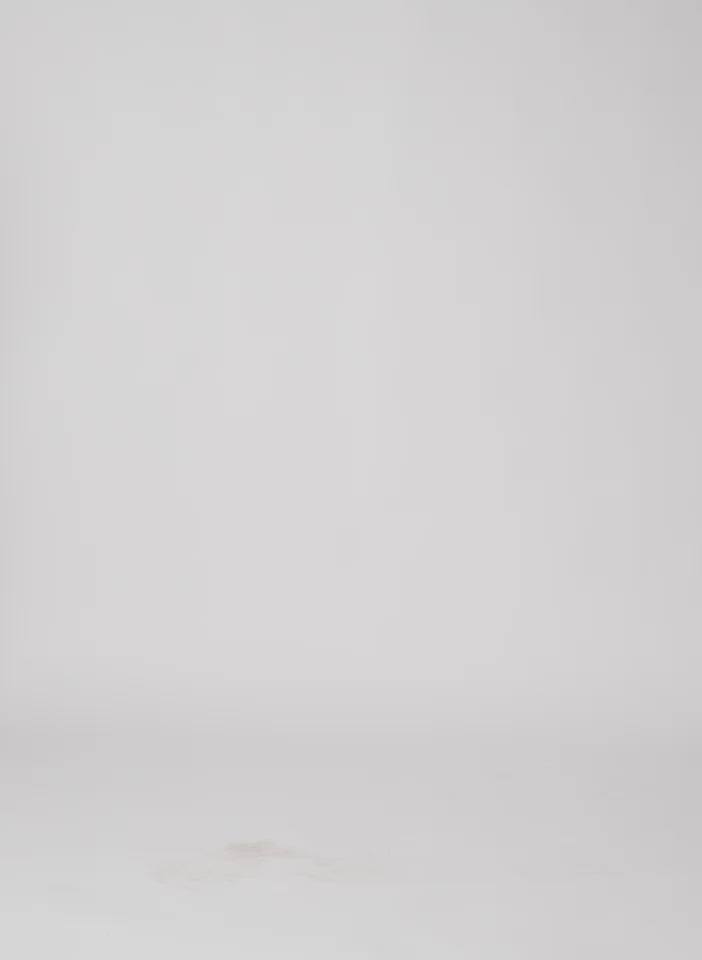 Model wearing the Bonded Viscose Easy V-Neck Crimson walking forward and turning around