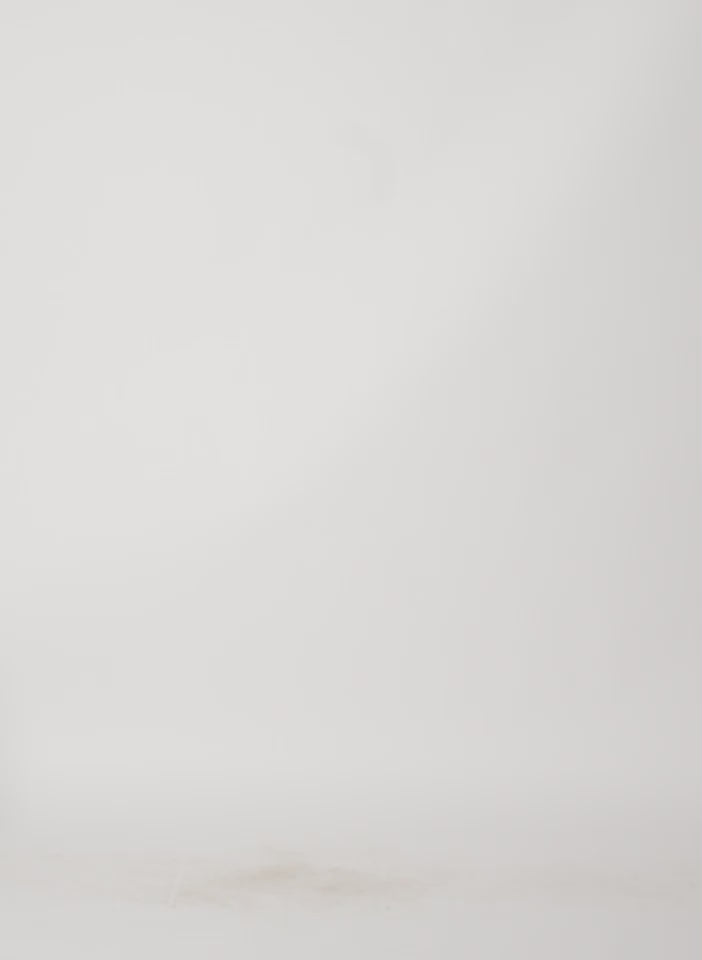 Model wearing the Bio Twill Bubble Skirt Optic White walking forward and turning around