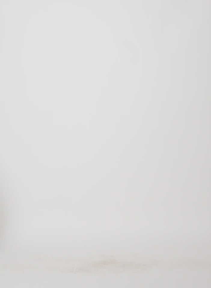 Model wearing the Deluxe Tube Yarn Sweater Tank White walking forward and turning around