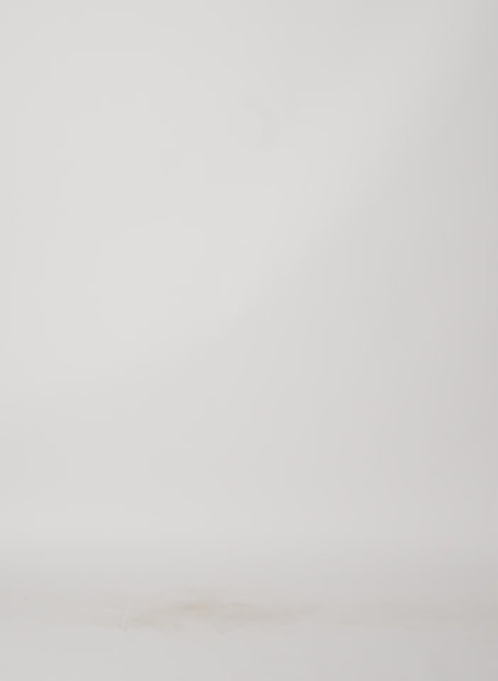 Model wearing the Crispy Sweater With Cut Out Detail Black walking forward and turning around