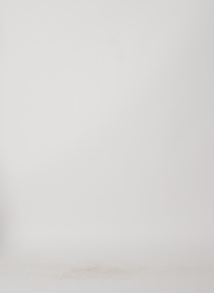 Model wearing the Striped Tech Poplin Raglan Tucked Shirt Ivory/White Multi walking forward and turning around