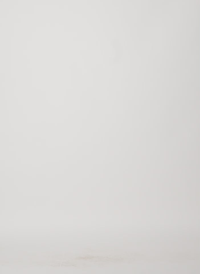 Model wearing the Leather Raglan Sleeve Blazer Brown walking forward and turning around