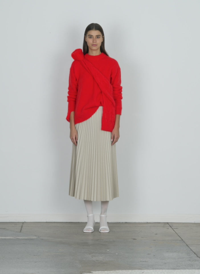 Model wearing the soft mohair crewneck easy pullover red walking forward and turning around