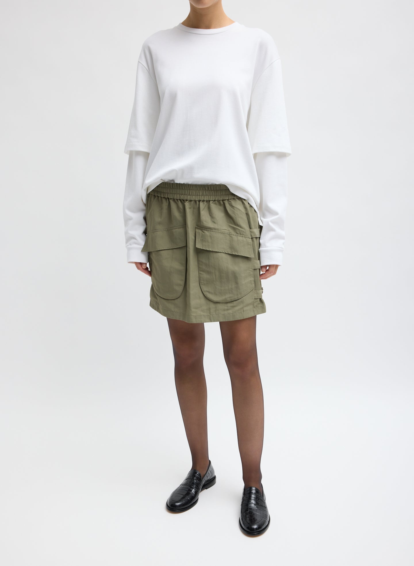 Techy Twill Pull On Mini Skirt - Dark Hazelnut Green Techy Twill Pull On Mini Skirt - front view on model