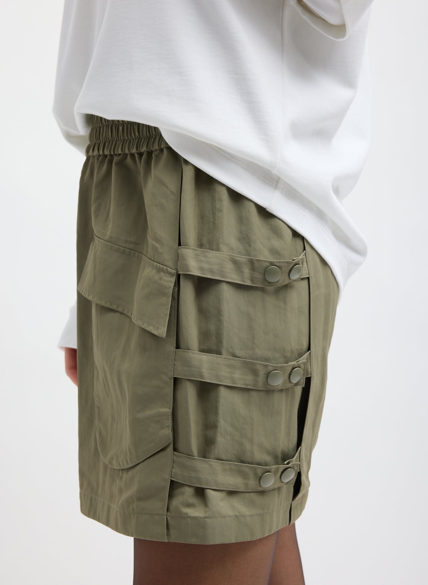 Dark Hazelnut Green Techy Twill Pull On Mini Skirt - closeup of side detail