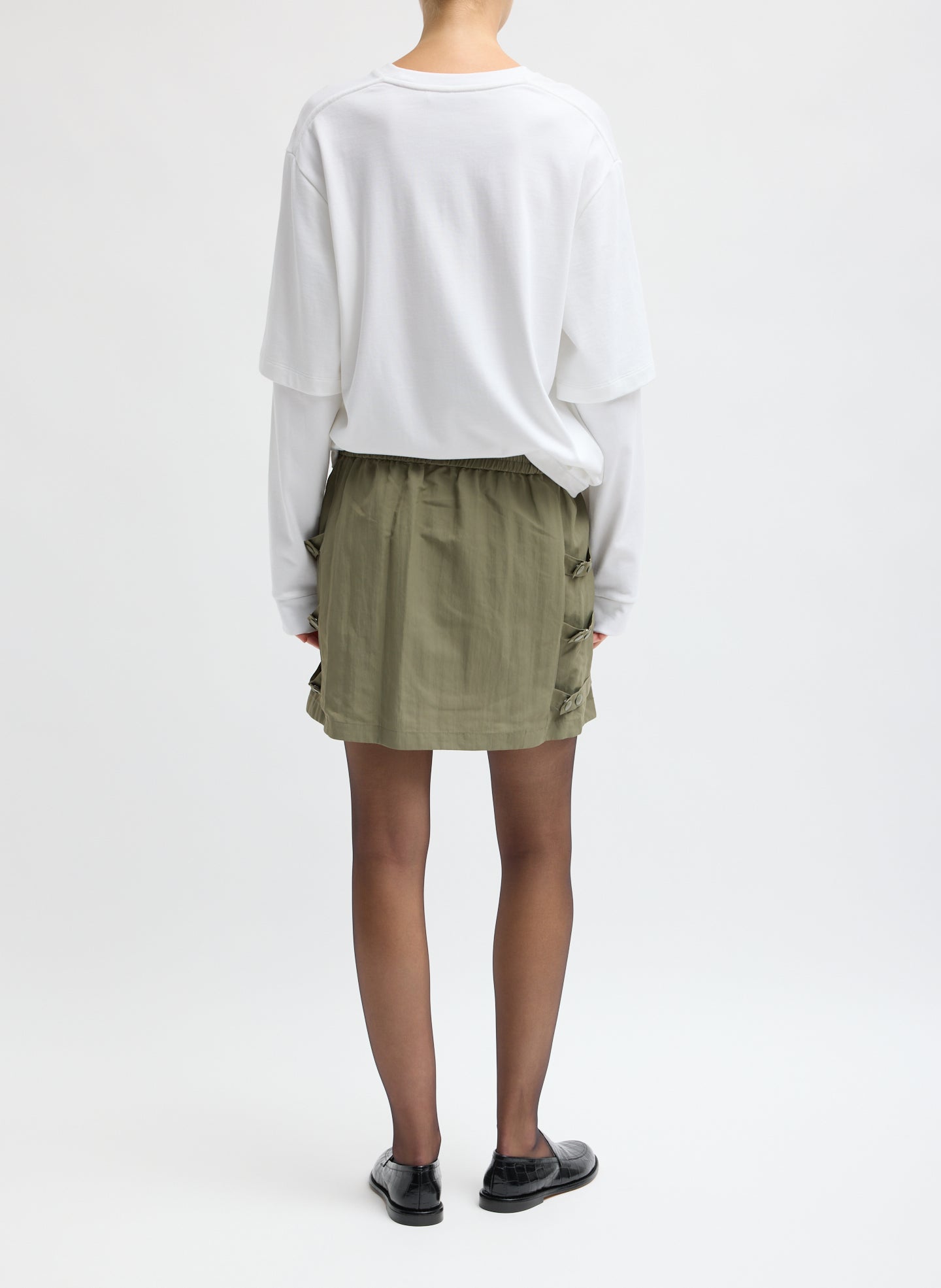 Dark Hazelnut Green Techy Twill Pull On Mini Skirt - back view on model