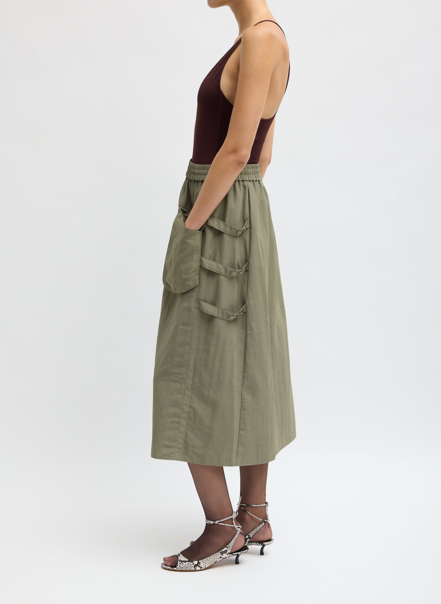 Dark Hazelnut Techy Twill Pull On Midi Skirt - side view on model