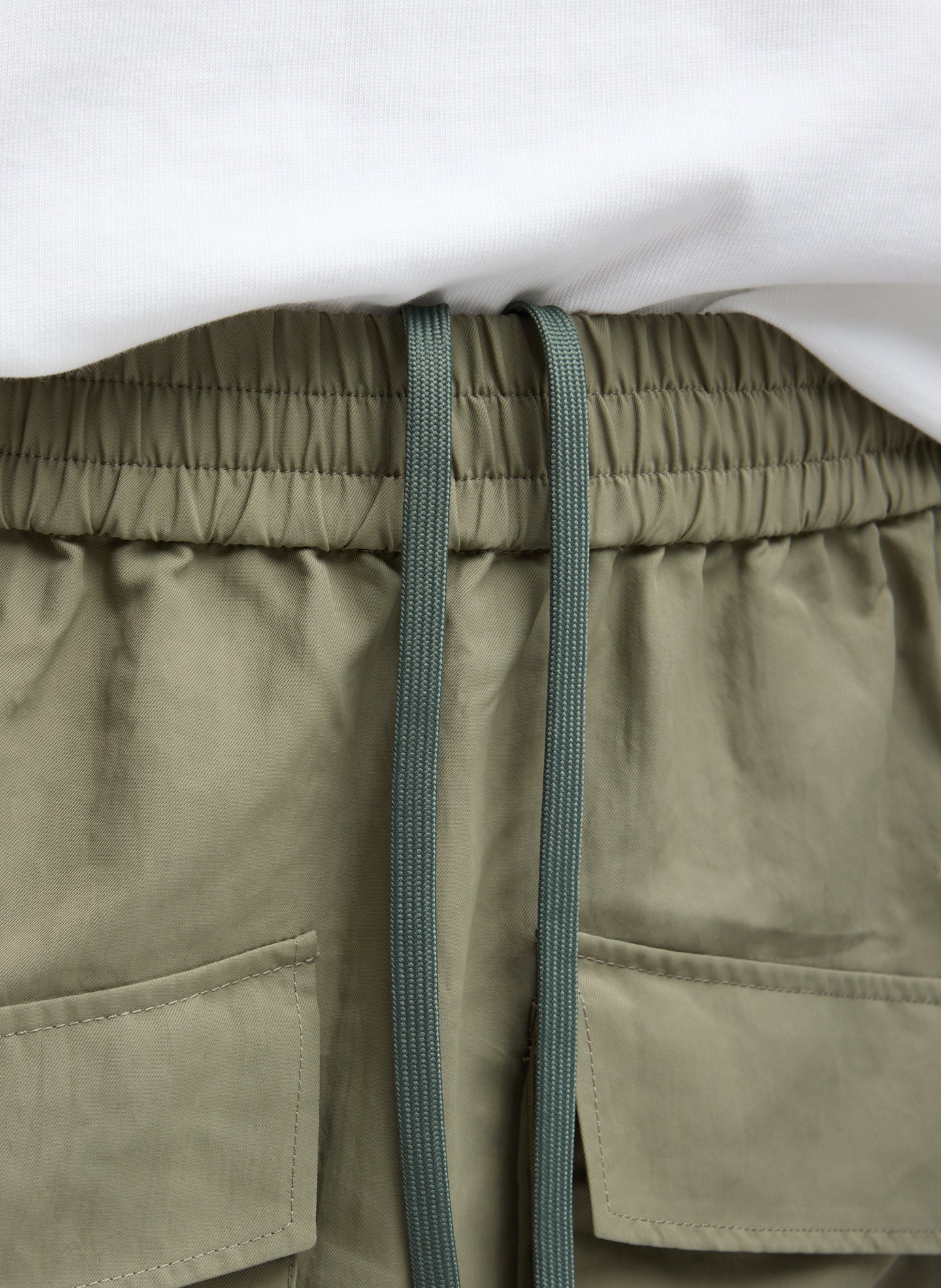 Dark Hazelnut Green Techy Twill Pull On Mini Skirt - closeup of drawstring detail