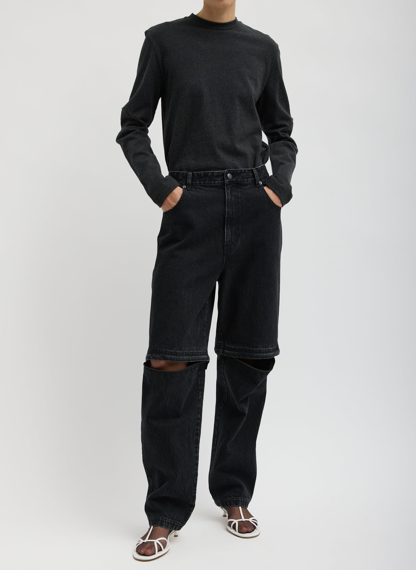 Black Denim Lars Convertible Zip Jean - unzipped, front view on model