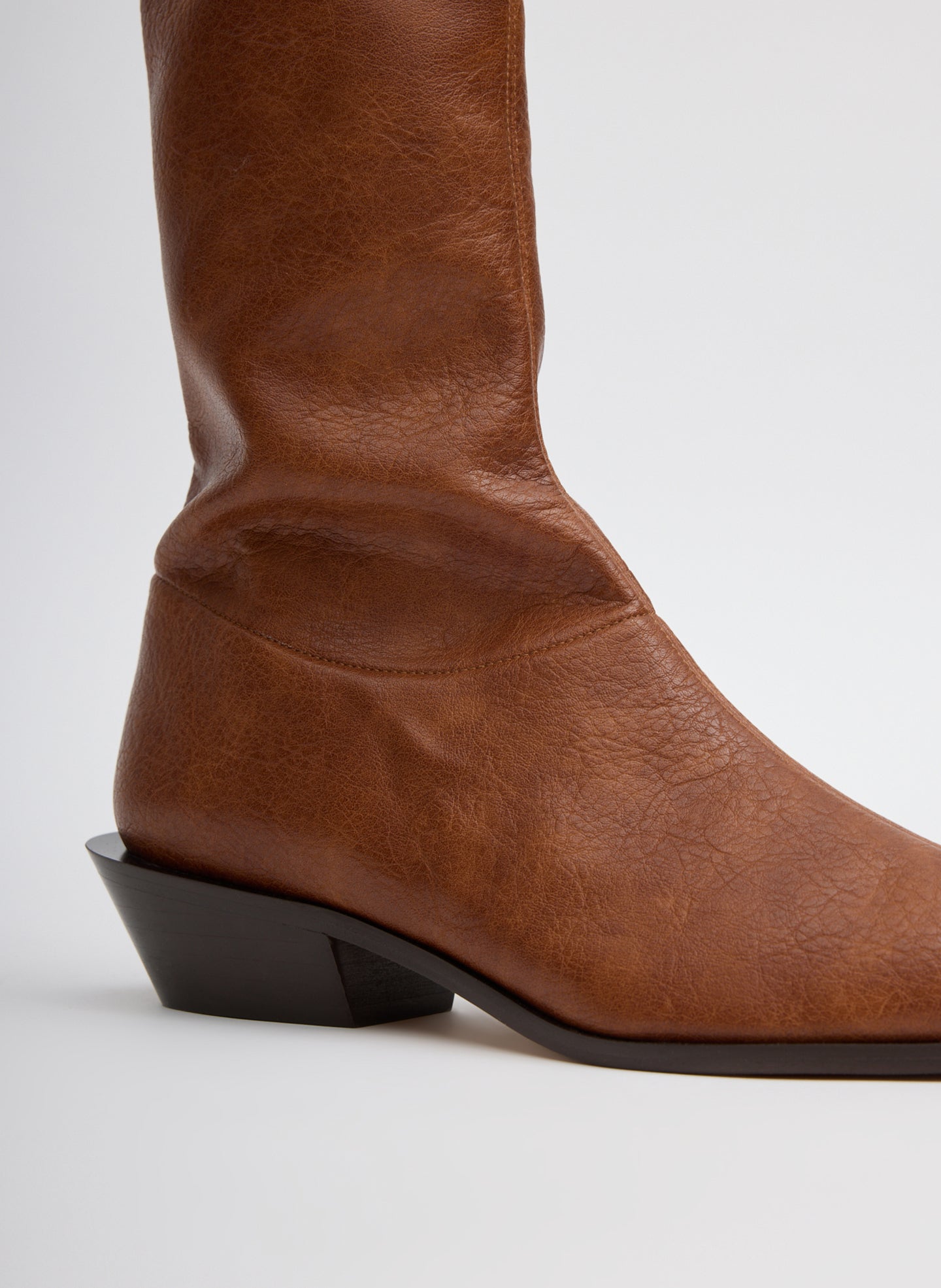 Cognac Brown Faux Leather Leo Boot - closeup of faux leather fabrication