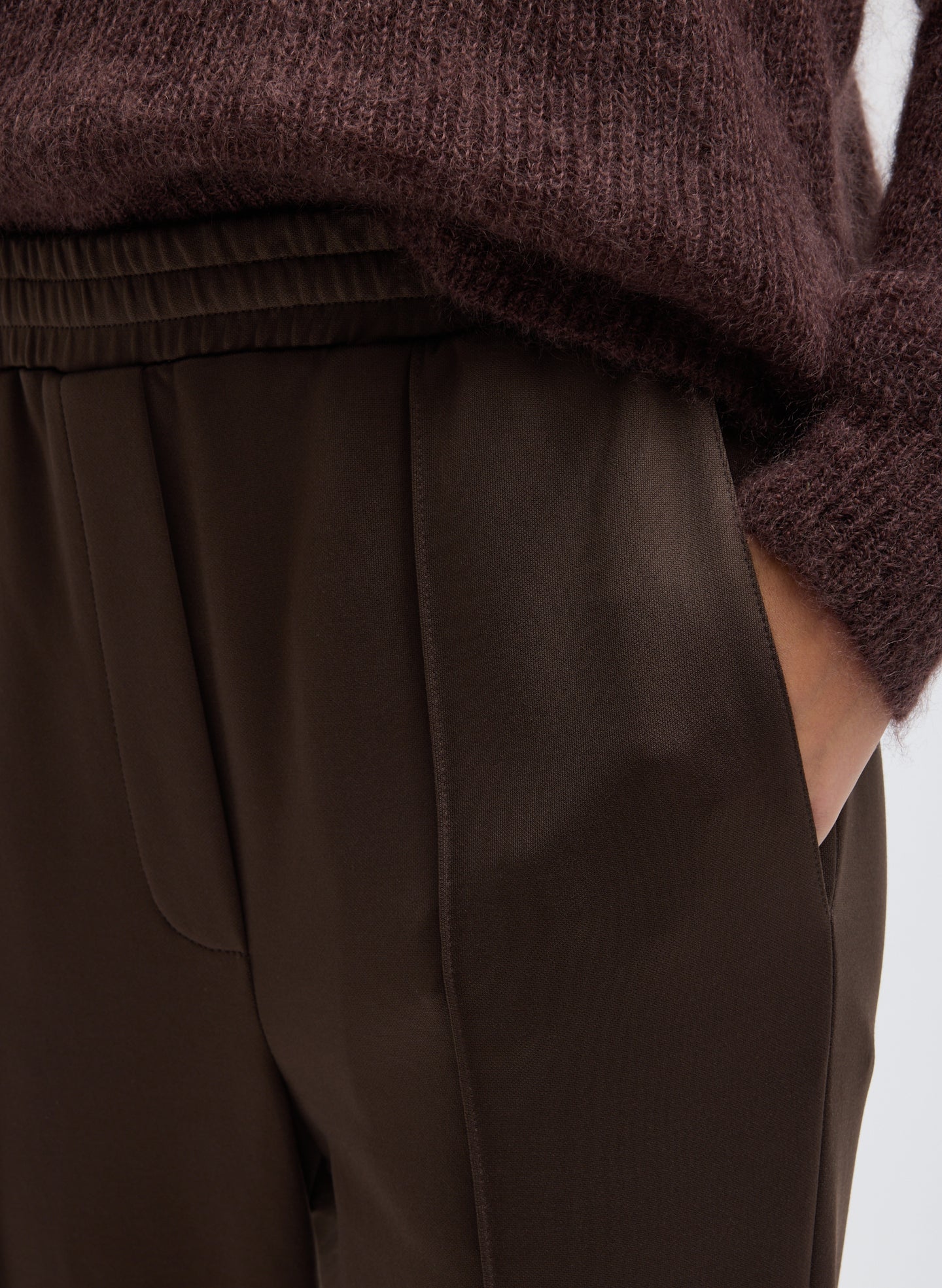 Brown Active Knit Sporty Stirrup Pant - closeup of front pocket detail
