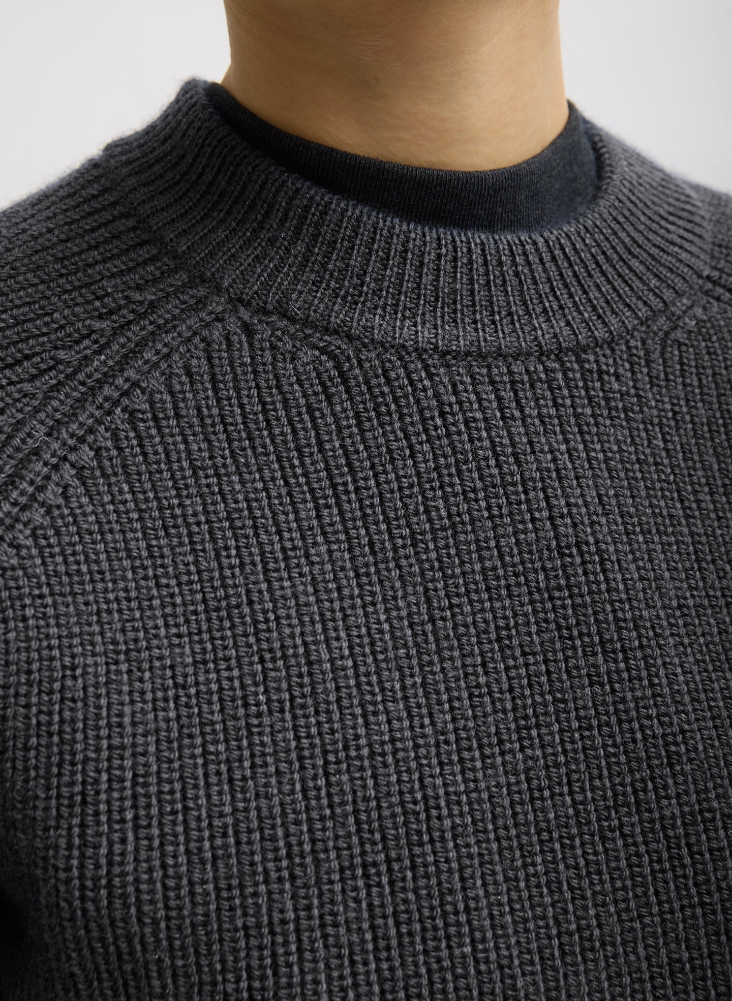 Dark Heather Grey Cardigan Stitch Wool Shrunken Crewneck Pullover - closeup of ribbed neckline
