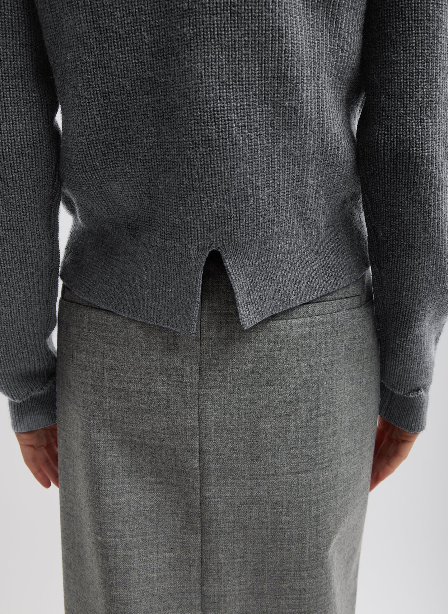Dark Heather Grey Cardigan Stitch Wool Shrunken Crewneck Pullover - closeup of split detail at back