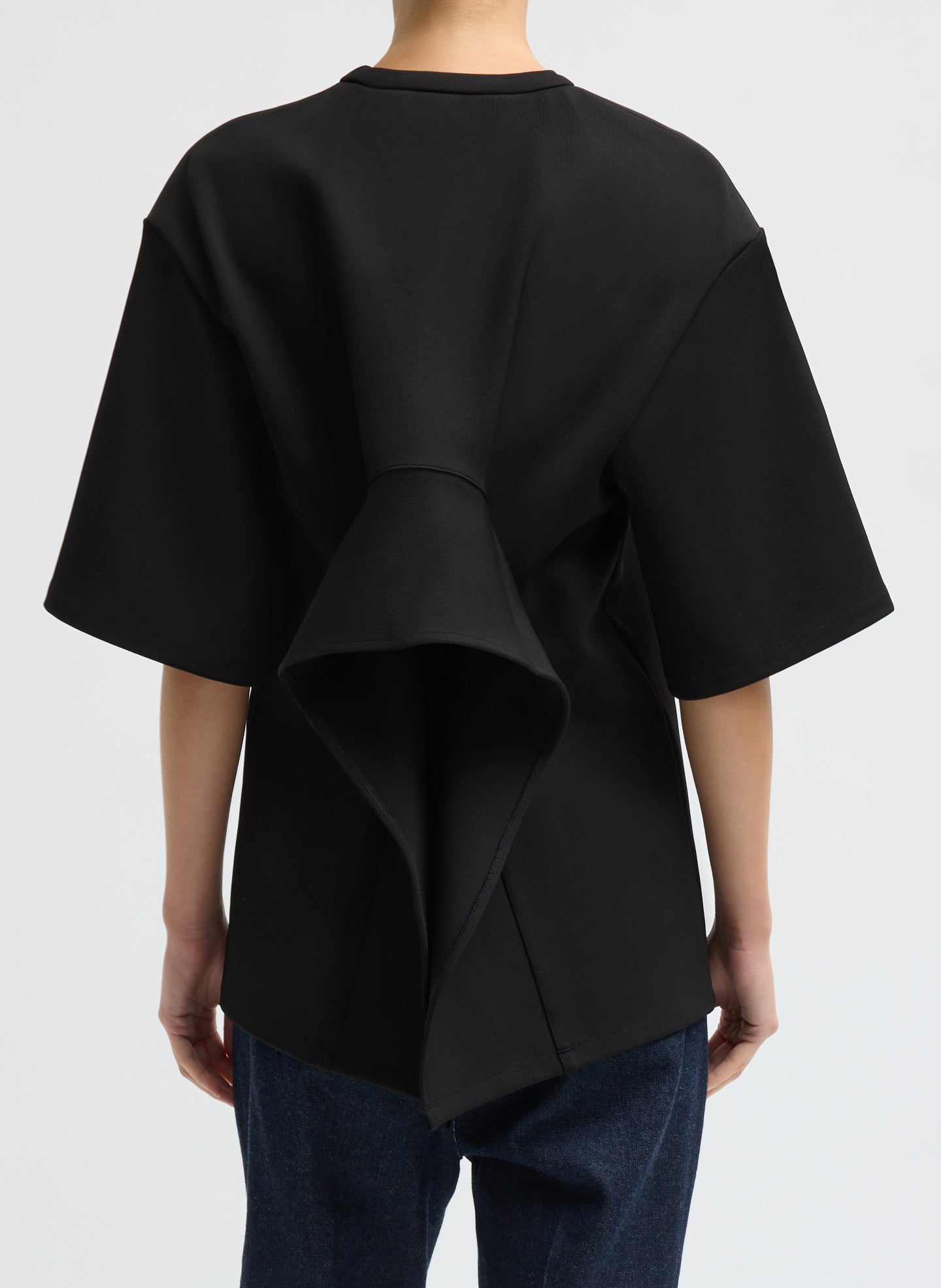 Black Luxe Crepe Knit Easy Tunic Top - short sleeve t-shirt, back view on model