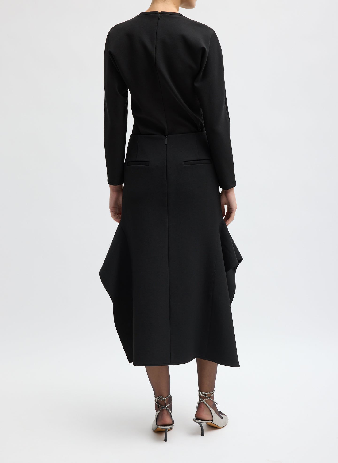 Black Luxe Crepe Knit Side Drape Skirt - back view on model