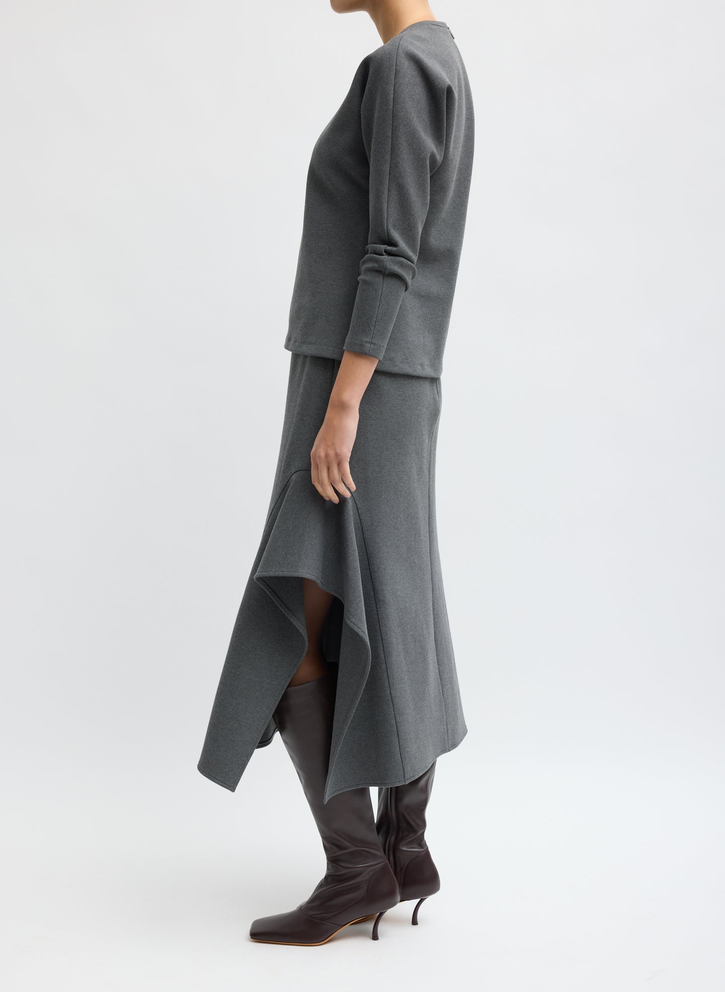 Charcoal Grey Luxe Crepe Knit Side Drape Skirt - side view on model