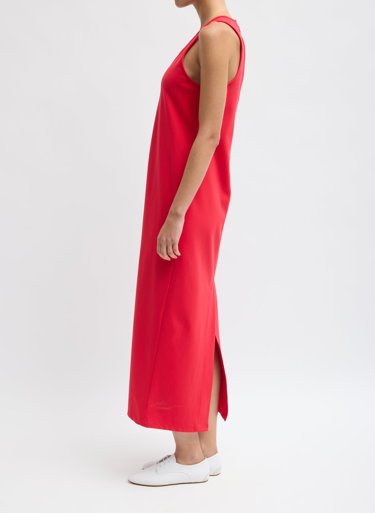 Red Compact Ultra Stretch Knit Sleeveless Dress - side view on model
