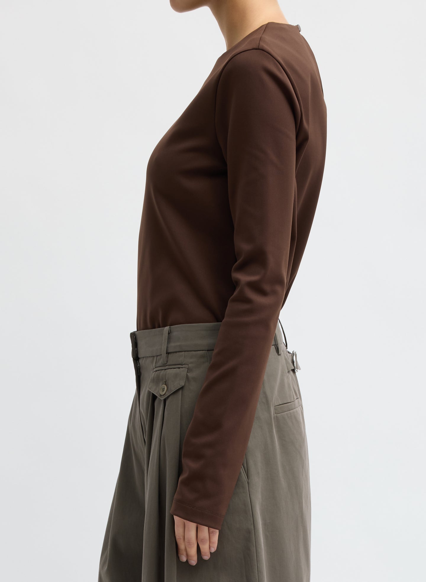 Brown Compact Ultra Stretch Knit Long Sleeve Slim Top - side view on model