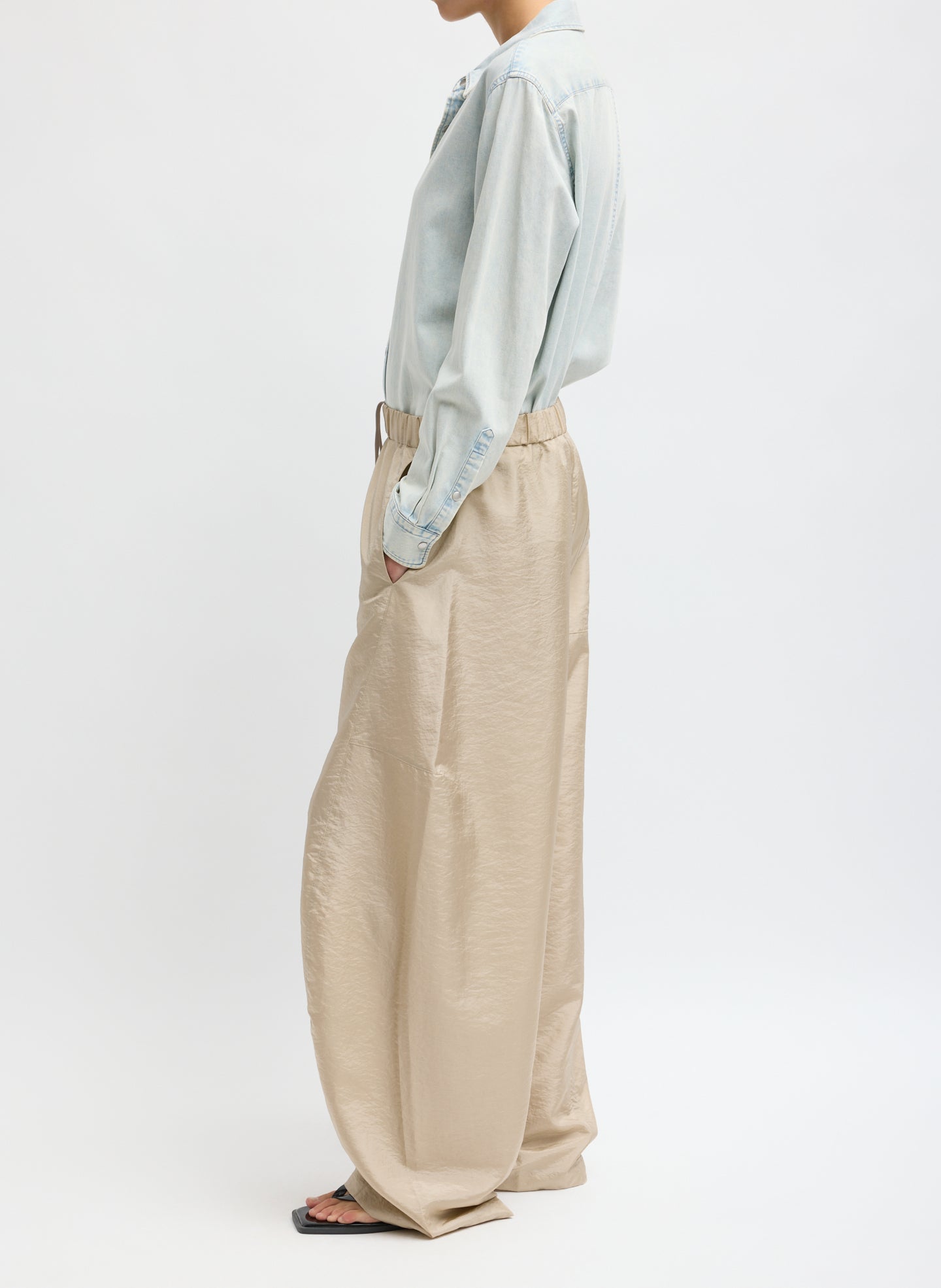 Desert Sand Crispy Nylon Winslow Pant - barrel leg pant, side view on model