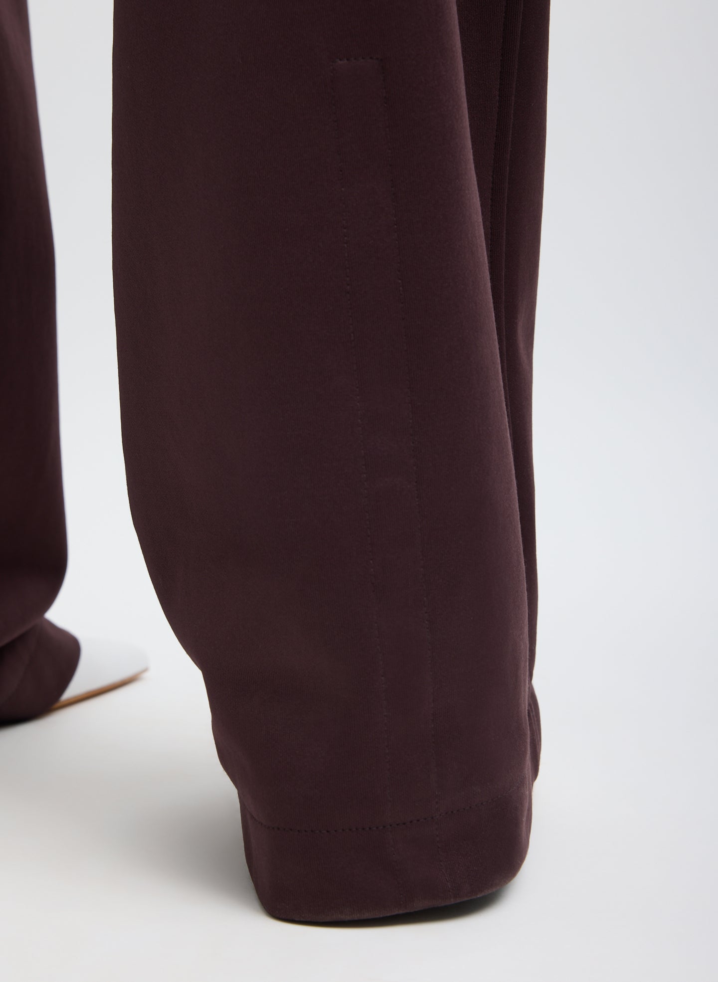 Brown Active Knit Scottie Jogger - closeup of snap detail at hem