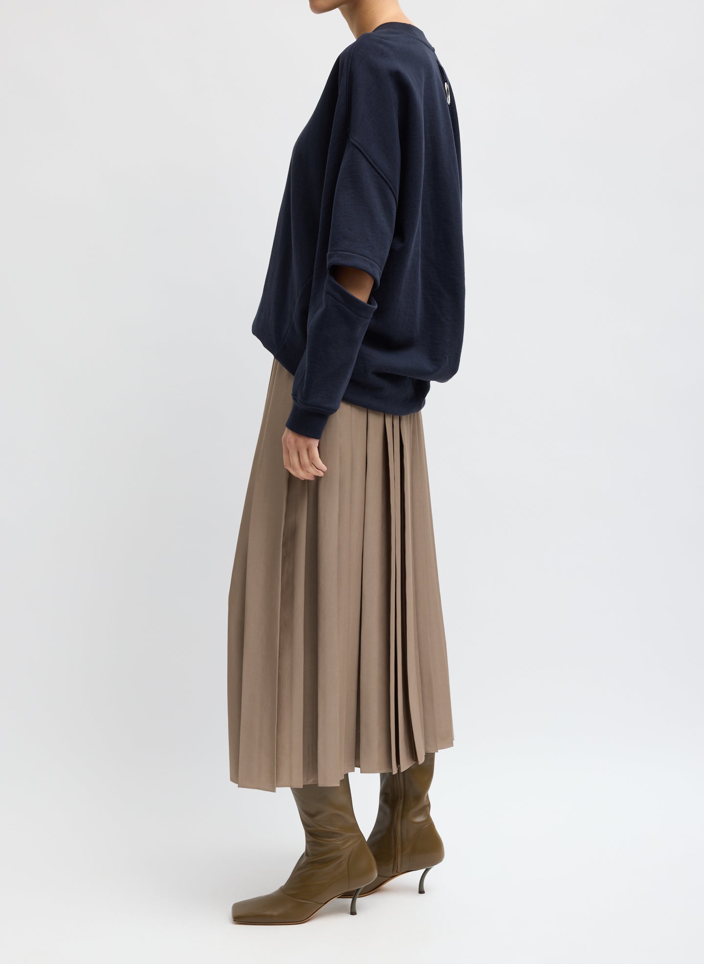 Latte Feather Weight Pleated Pull On Skirt - side view on model