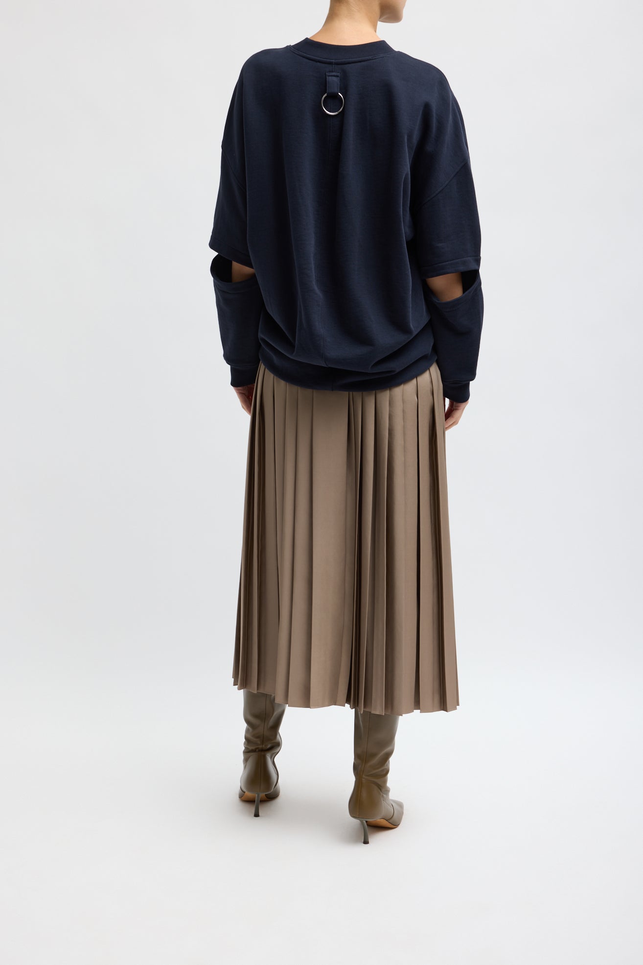 Latte Feather Weight Pleated Pull On Skirt - back view on model