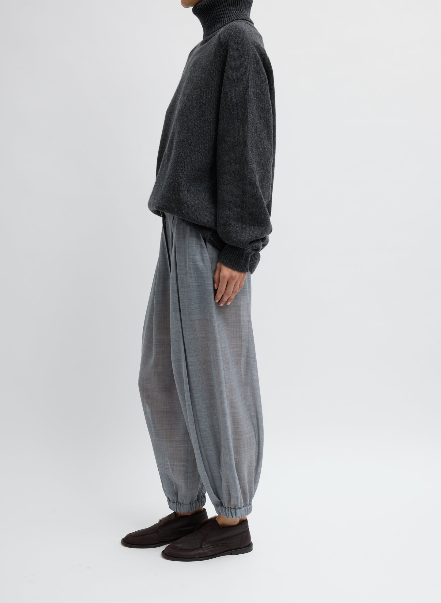 Heather Grey Sheer Wool Gauze Pleated Balloon Pant – relaxed fit, side view on model 
