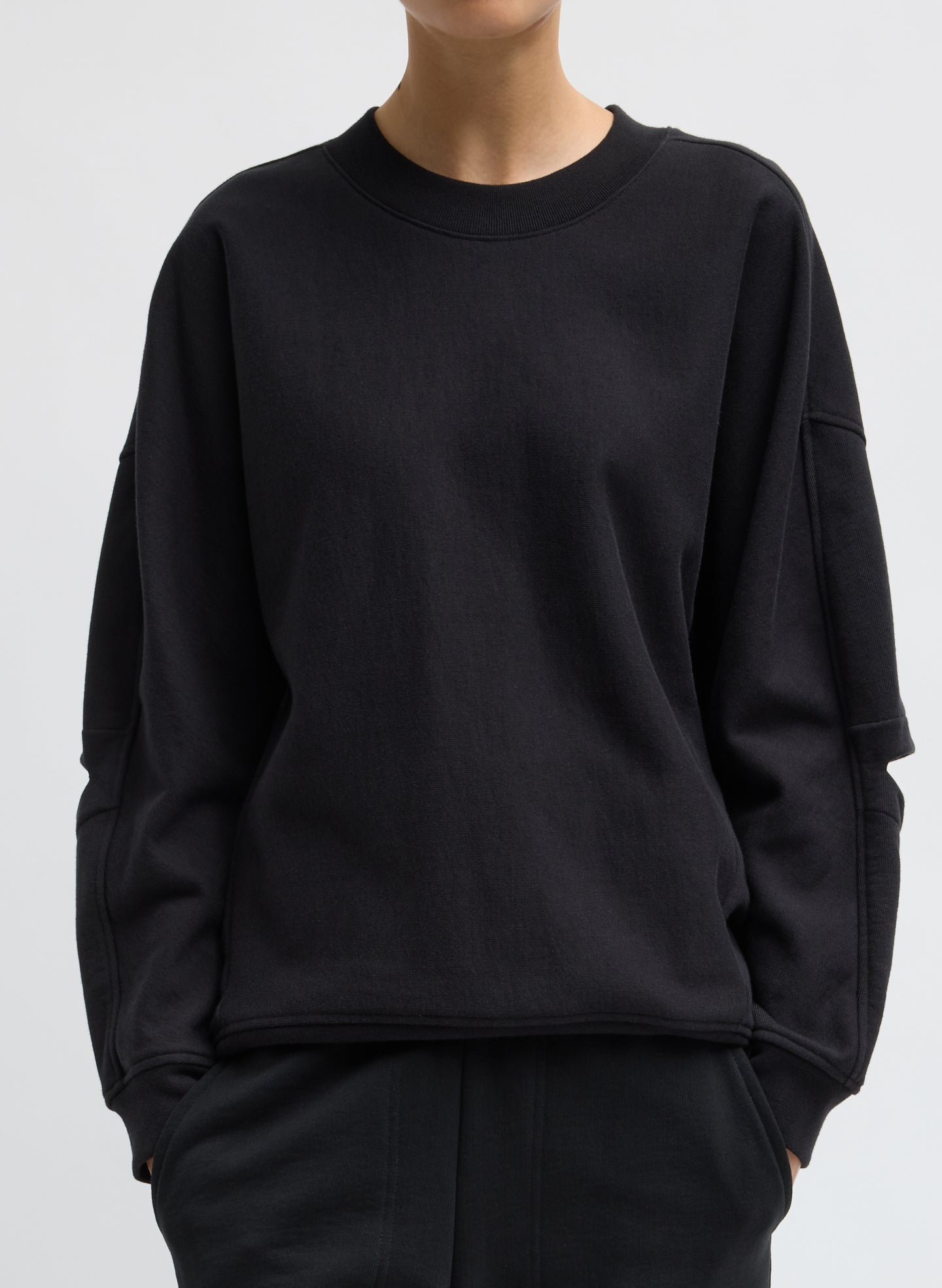 Black Cocoon Crewneck Sweatshirt - front view on model