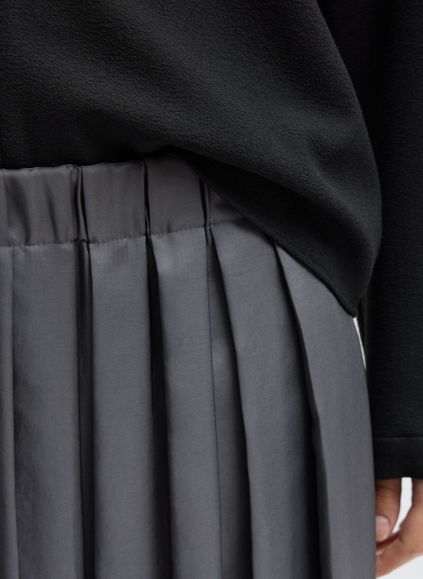 Grey Feather Weight Pleated Pull On Skirt - closeup of pleated detail